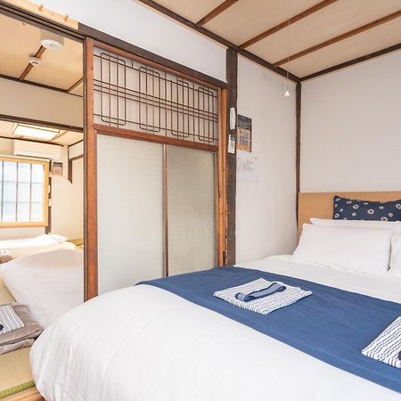 Guesthouse Oneworld Shijo四条京町屋 Киото Экстерьер фото